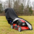 Black waterproof Oxford lawn mower cover fitted over a walk-behind mower