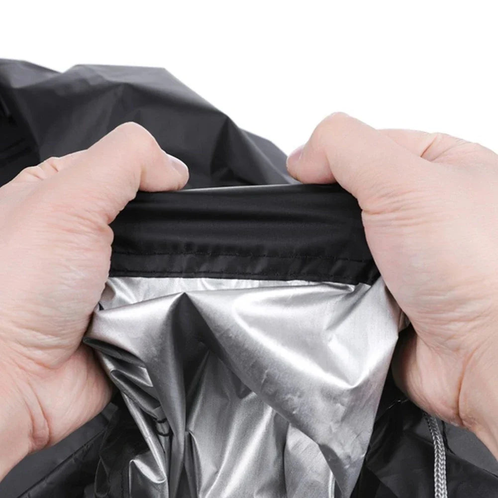 Lawn mower cover folded, showing the black finish
