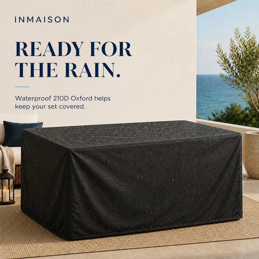 Patio furniture cover beaded with rain on a patio